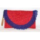 Borsa in rafia rossa con pizzo in blu.